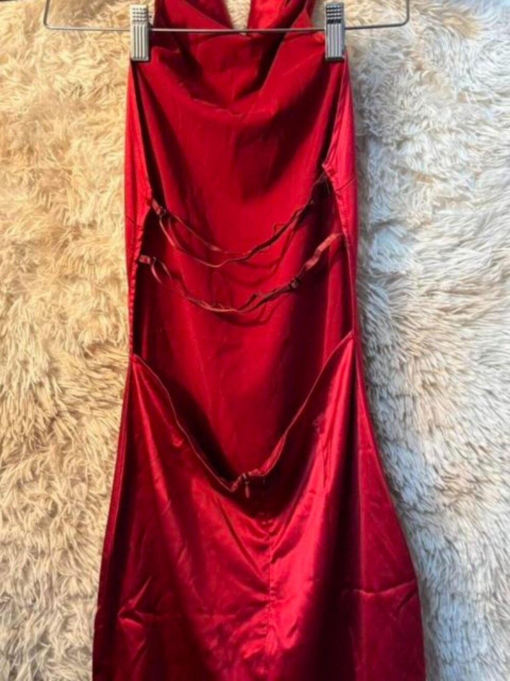 Red satin maxi dress with halter neck and tie back detail. Size: S